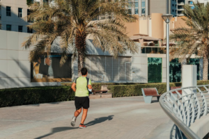 A graphic header reading 'Dubai Work Culture and Professional Life' with business networking and office icons, KhaleejFusion