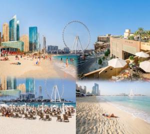 Crowded, vibrant sandy shoreline at JBR Beach with turquoise waters and beach umbrellas.